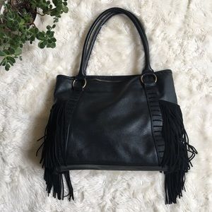 **sold***Volcom stone row fringe black vegan leather purse.